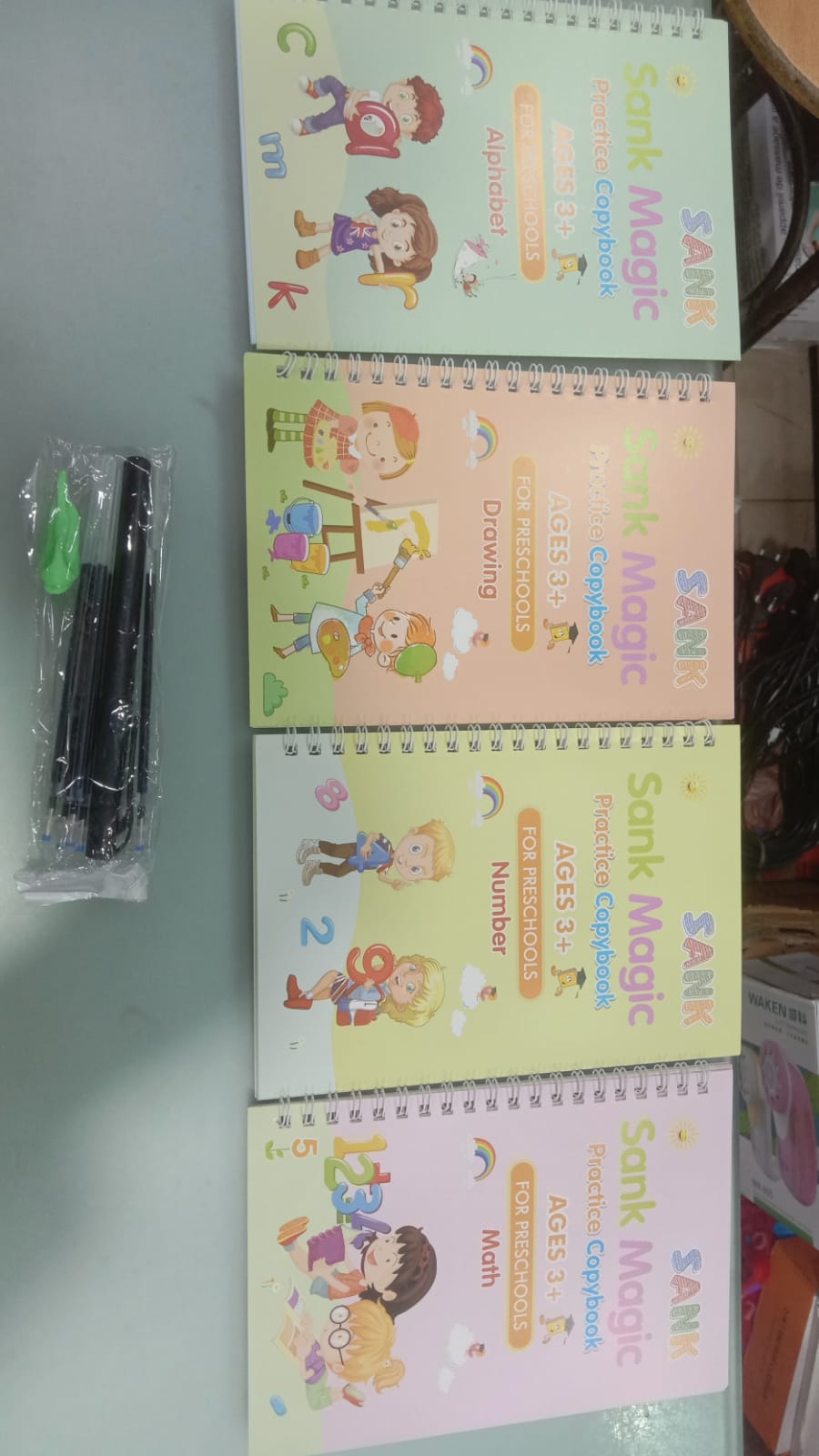 sank-magic-book-practice-sank-magic-book-for-montessori-children-tracing-handwriting-first-pre-school-baby-learning-books-for-kids-4-books-magic-pen-with-ink-refills_PD5440