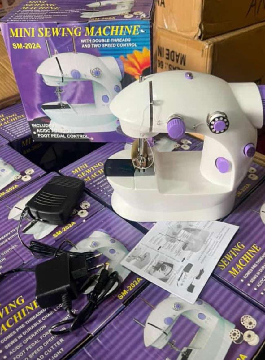 mini-sewing-machine-electric-hand-small-sewing-machines-mini-motor-electric-sewing-machine-for-home_PD4258